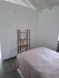 Ένα ή περισσότερα κρεβάτια σε δωμάτιο στο Bungalow AN KAN LA