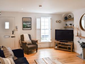 TV a/nebo společenská místnost v ubytování Stones Throw