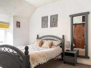 Ένα ή περισσότερα κρεβάτια σε δωμάτιο στο Smithy Apartment