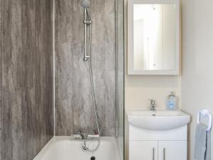 a bathroom with a shower and a sink at Lodge 46 - Uk49669 in Bridlington +11 photos