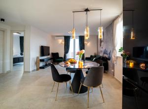 Posedenie v ubytovaní Apartments Sweet Escape