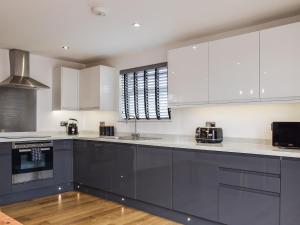 Η κουζίνα ή μικρή κουζίνα στο Highfield Bungalow