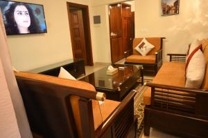 TV a/nebo společenská místnost v ubytování Grand Hôtel Aéroport, Douala + 15 fotografií