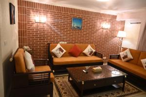 Posezení v ubytování Grand Hôtel Aéroport, Douala