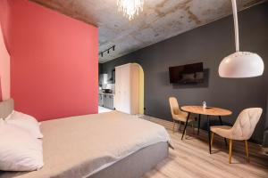 Ένα ή περισσότερα κρεβάτια σε δωμάτιο στο Уютная около Арбата, ЖК Меридиан