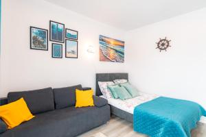 Postel nebo postele na pokoji v ubytování APARTAMENT NADMORSKI