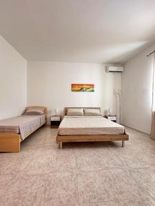 Postel nebo postele na pokoji v ubytování Giorgia