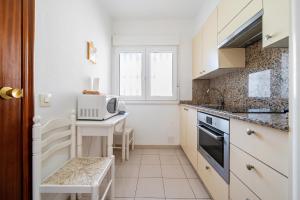 Kuchyň nebo kuchyňský kout v ubytování Playa Dorada B106