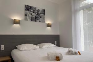 Villa Afrique du Sud - Domaine Le Sherwoodにあるベッド