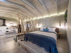 Postel nebo postele na pokoji v ubytování Vayas Residences - Legacy