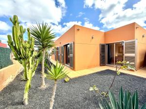 a house with a cactus in front of it at Fuerteventura Velvet Golf in Antigua