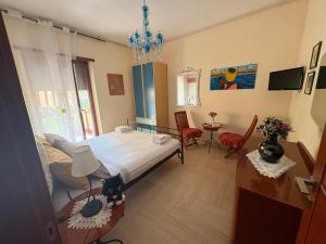 Ένα ή περισσότερα κρεβάτια σε δωμάτιο στο Casa Vacanze PepeNero +34 φωτογραφίες