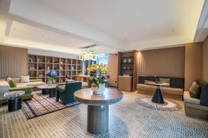 Posezení v ubytování Kunming Spring City Boutique Hotel