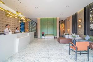 Posezení v ubytování Kunming Spring City Boutique Hotel