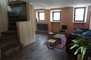 TV a/nebo společenská místnost v ubytování l'entresort