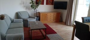 TV a/nebo společenská místnost v ubytování Gästehaus Tarmann