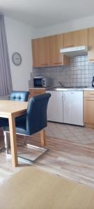 Kuchyň nebo kuchyňský kout v ubytování Gästehaus Tarmann