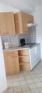 Kuchyň nebo kuchyňský kout v ubytování Gästehaus Tarmann