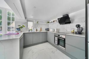 Η κουζίνα ή μικρή κουζίνα στο Georgian Coach House in a Prime Location in Deal