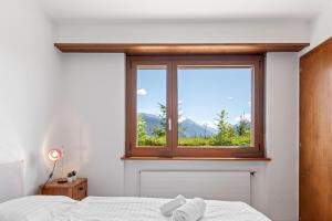 Postel nebo postele na pokoji v ubytování Crans-Montana - 6 pers - 5 lits - 2 parkings