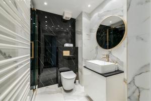 Ένα μπάνιο στο Ogrodowa Premium by NorthSide Apartments +12 φωτογραφίες