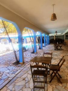 Posezení v ubytování Área de lazer 3 suítes 50 ps