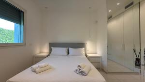 Φωτογραφία από το άλμπουμ του Luxury Design Pool and Solarium σε Fontane Bianche