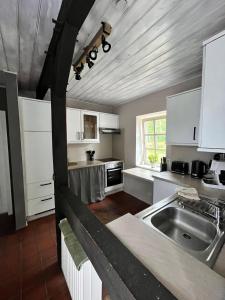 Nhà bếp/bếp nhỏ tại Piets Hof, Ferienhaus +7 ảnh