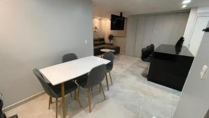 Atpūtas zona naktsmītnē Moderno Apartamento Primer Piso Cerca de Pereira