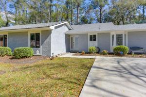 a house with a driveway in front of it at 5 Mi to Dtwn Beaufort Home with Screened-In Patio in Port Royal