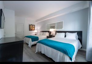 Katil atau katil-katil dalam bilik di Inspiration Condo Near Disney With Free Shuttle +77 gambar