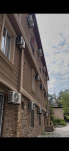 a building with air conditioners on the side of it at Guest House Kobuleti 516 in K'obulet'i