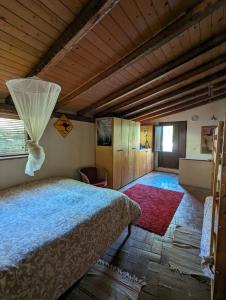 Postel nebo postele na pokoji v ubytování Casa Aloe nel cuore della sicilia