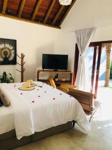 TV/trung tâm giải trí tại Villa Pantai Boutique Hotel Maragogi