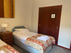 Katil atau katil-katil dalam bilik di Welltrees Apartments 8 Dailly Road