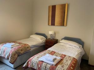 Katil atau katil-katil dalam bilik di Welltrees Apartments 8 Dailly Road +7 gambar