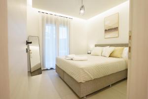 Giường trong phòng chung tại E&Y Luxury Apartment