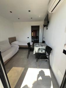 Postel nebo postele na pokoji v ubytování Sidi's GuestHouse