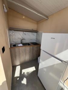 Kuchyň nebo kuchyňský kout v ubytování Sidi's GuestHouse