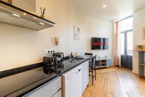 Η κουζίνα ή μικρή κουζίνα στο Studio Design en Plein Centre d'Agen