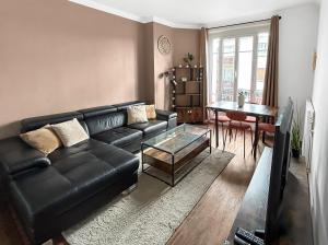 Χώρος καθιστικού στο Appartement lumineux et spacieux avec 2 chambres