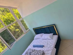 Postel nebo postele na pokoji v ubytování Bujtina Trofta Jone + 20 fotografií