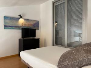 Cama o camas de una habitación en Loft Almagro