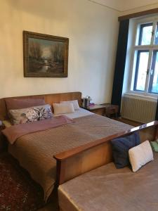 Postel nebo postele na pokoji v ubytování Vintage apartment with flair in Völkermarkt