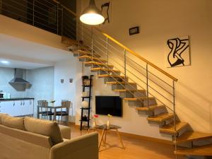 Una televisión o centro de entretenimiento en Loft Almagro
