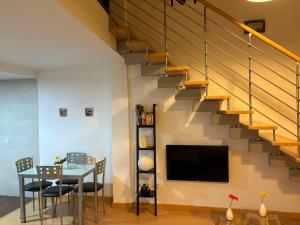 Una televisión o centro de entretenimiento en Loft Almagro