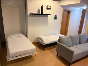 Cama o camas de una habitación en Loft Almagro