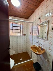 Koupelna v ubytování Villaggio Harmonia Monte Verde