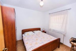 Postel nebo postele na pokoji v ubytování Kuća za odmor Mia u Lici