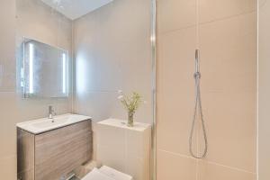 a bathroom with a shower and a toilet and a sink at Easter, Folly Lane, Salcombe in Salcombe